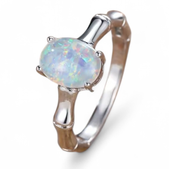 Modest Lu Jewelry - Silver Bamboo Opal Pendant Ring Size 7

Brand New